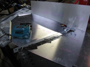 Cutting the passenger side floor.