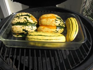 Squash cut length-wise, seeds removed and placed in a Pyrex baking dish with some boiling water. 
