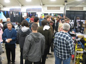 Despite the rain, there was a constant crush of people in, near and around the Not Your Grandpa's Ham Radio booth at the 2013 San Diego Mini Maker Faire